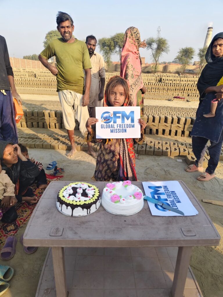 Global Freedom Mission field visit with community members at a brick kiln in Pakistan.