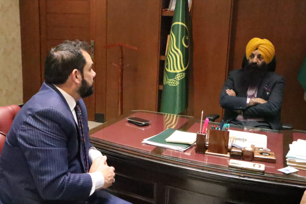Global Freedom Mission representatives in discussion with Sardar Ramesh Singh Arora at his office in Punjab, Pakistan.