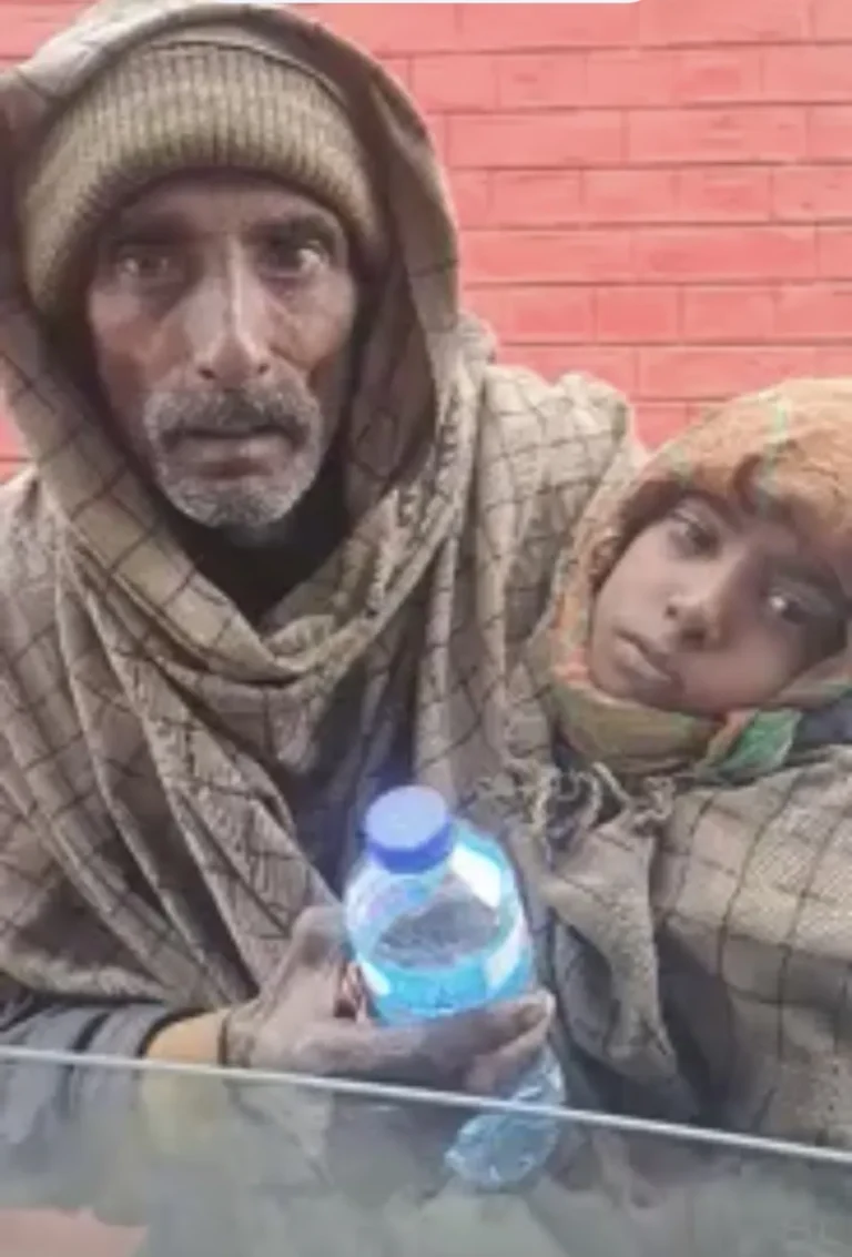 Man and child at a brick kiln in Pakistan